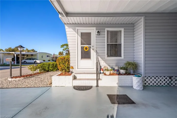 Property entrance with a porch
