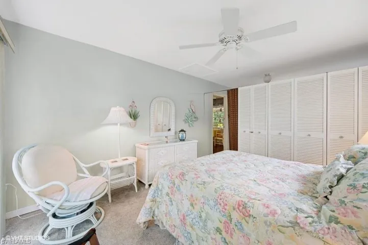 Bonus Room with light colored carpet, and ceiling fan