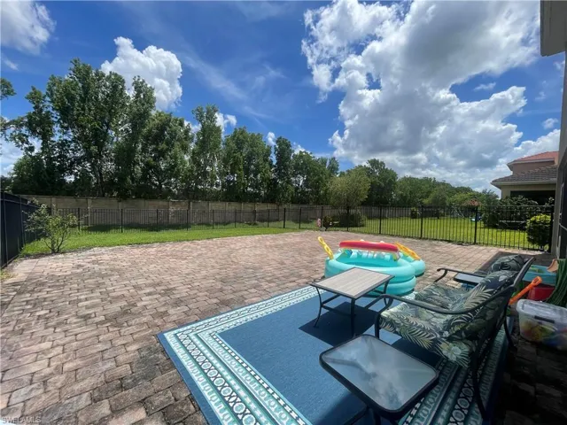 View of patio with a room for pool