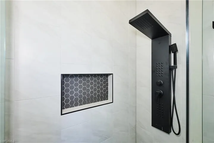 Bathroom view of tiled shower