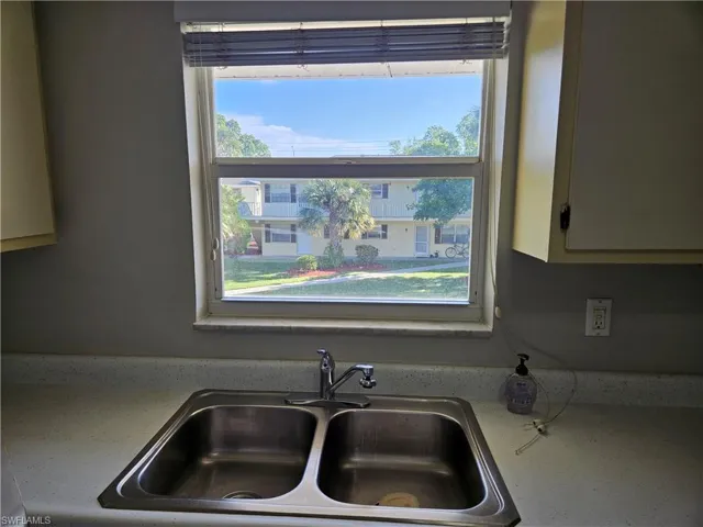 Kitchen with a wealth of natural light and sink