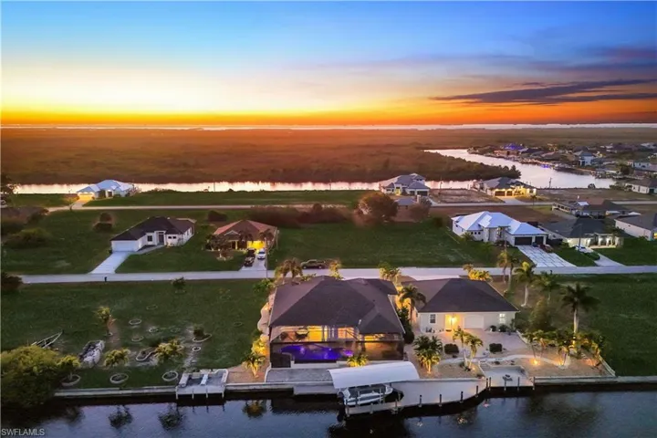 Aerial view of residential area with a nearby body of water