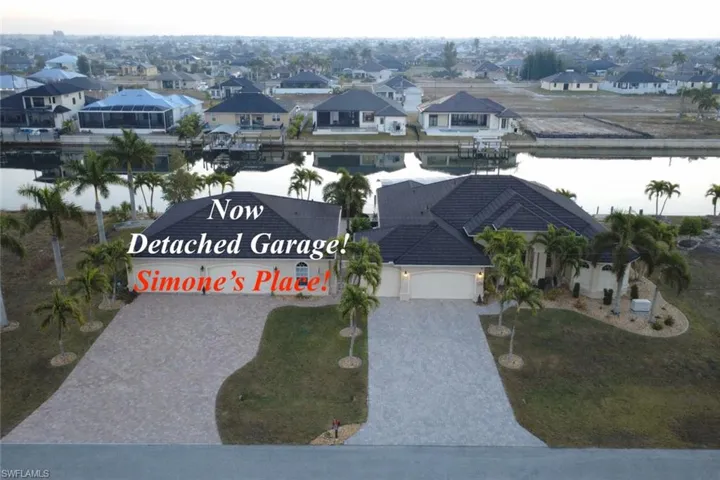 Aerial view of residential area with a large body of water