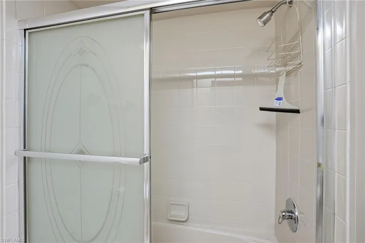 Full bath with enclosed tub / shower combo