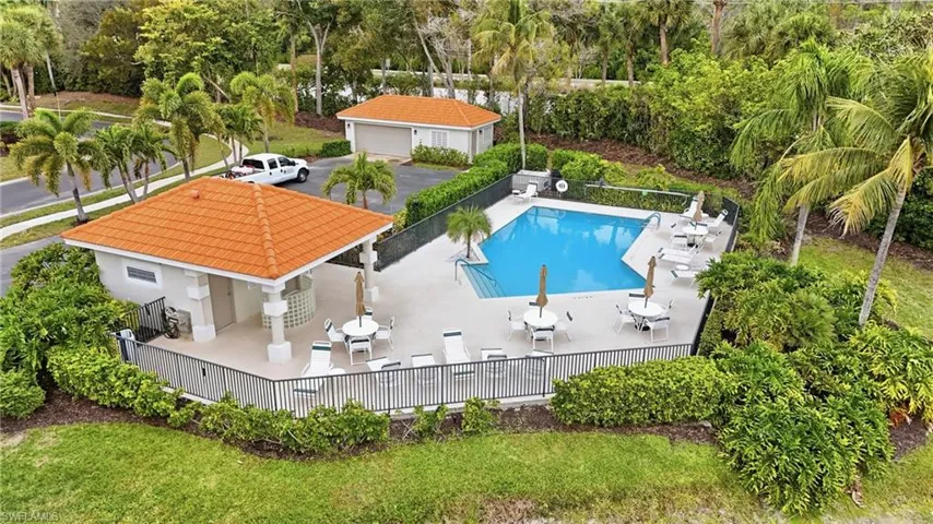 View of property's community featuring a bocce ball area and tennis courts