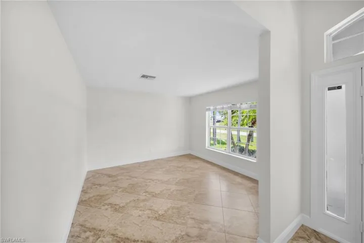 Spare room with baseboards