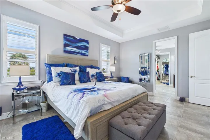 Large primary bedroom adjoins lanai.