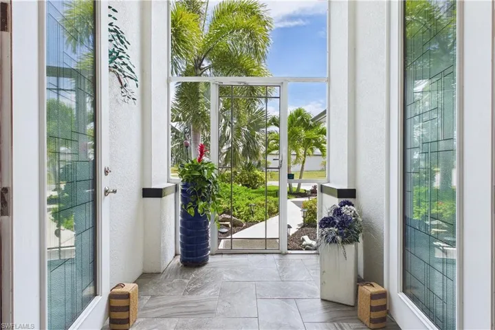 Expansive entry for privacy and allow breezes to flow through home.