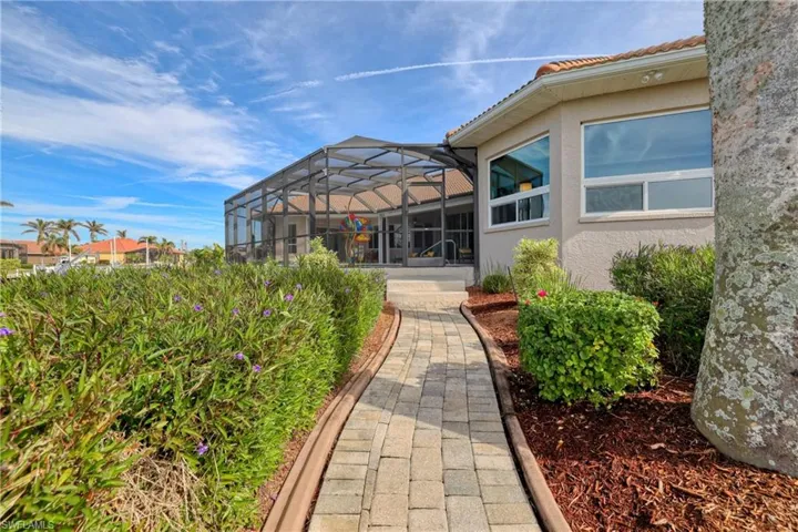 View of yard with a lanai