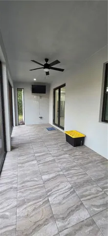 View of patio with ceiling fan