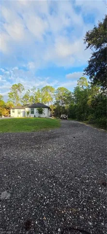 Ranch-style home with a front yard