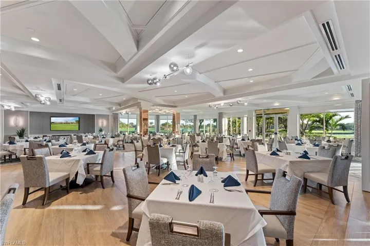 Dining space with recessed lighting, light wood-style flooring, and beamed ceiling