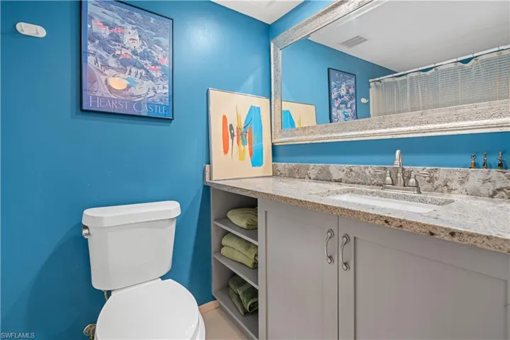 Bathroom with vanity and toilet