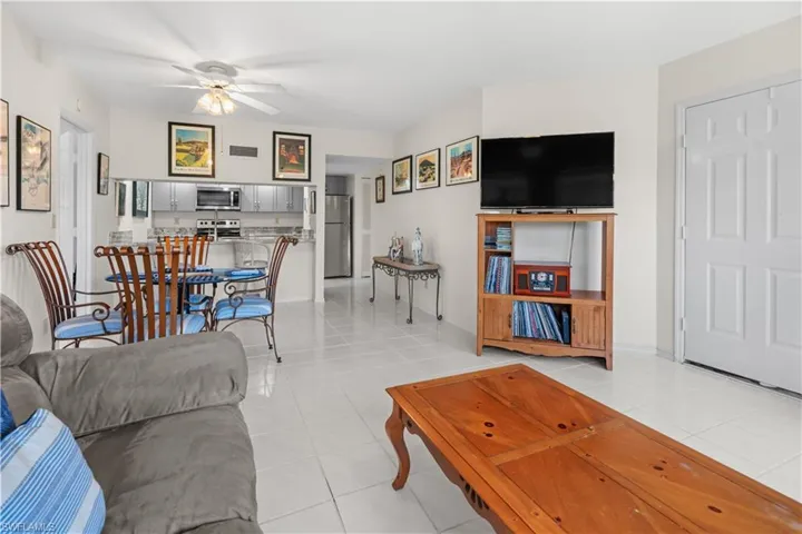 Tiled living room with ceiling fan