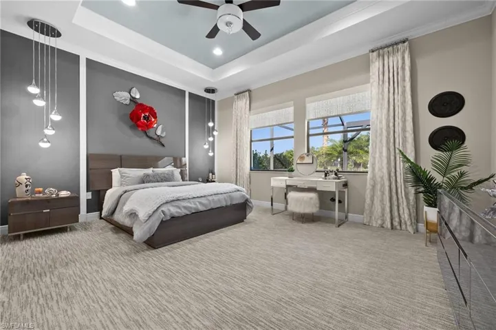 Extra spacious master bedroom with upgraded lighting and crown molding