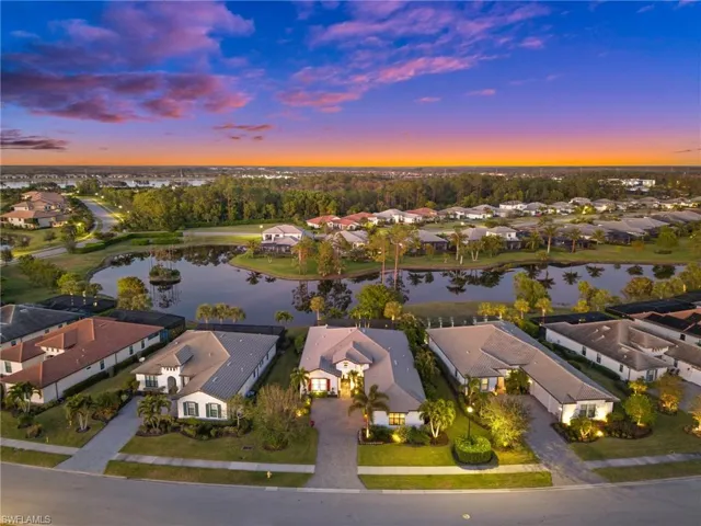 Aerial view at dusk with a water view