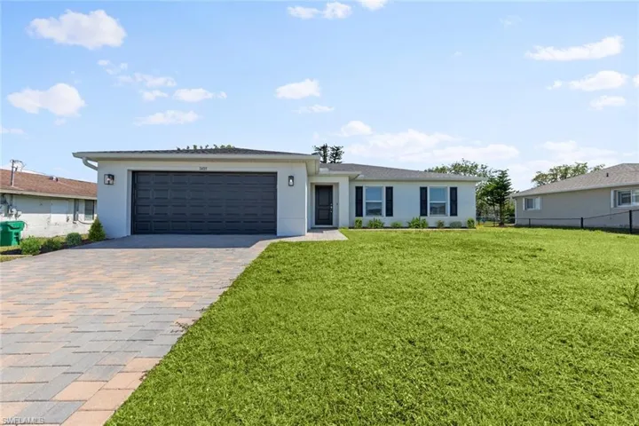 driveway, and a front lawn