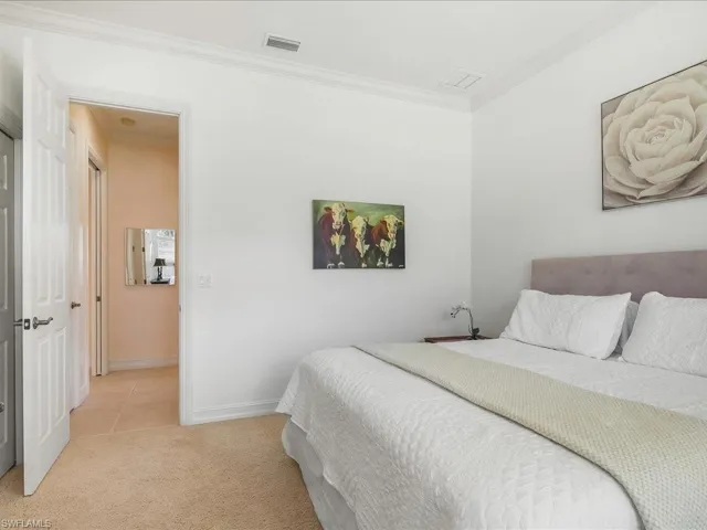Kings Size bed in this guest bedroom . Lots of light with huge windows