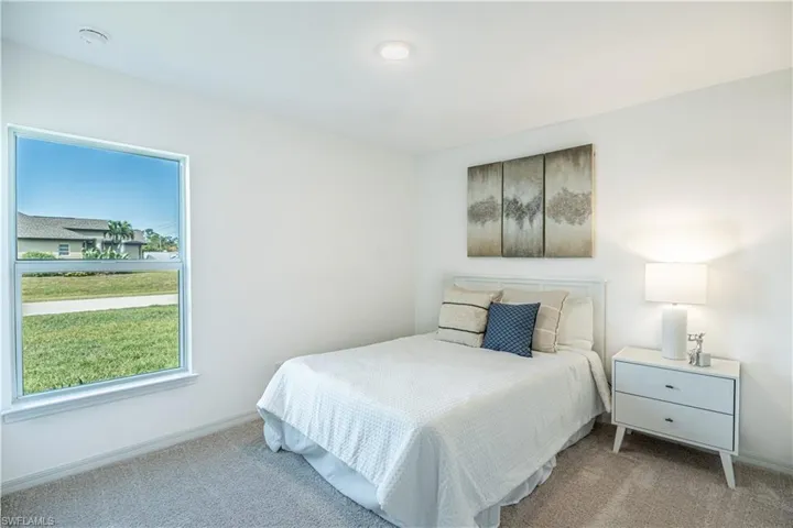 Bedroom featuring carpet floors