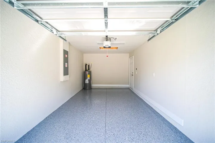 The Garage Floor Has An Epoxy Coating!