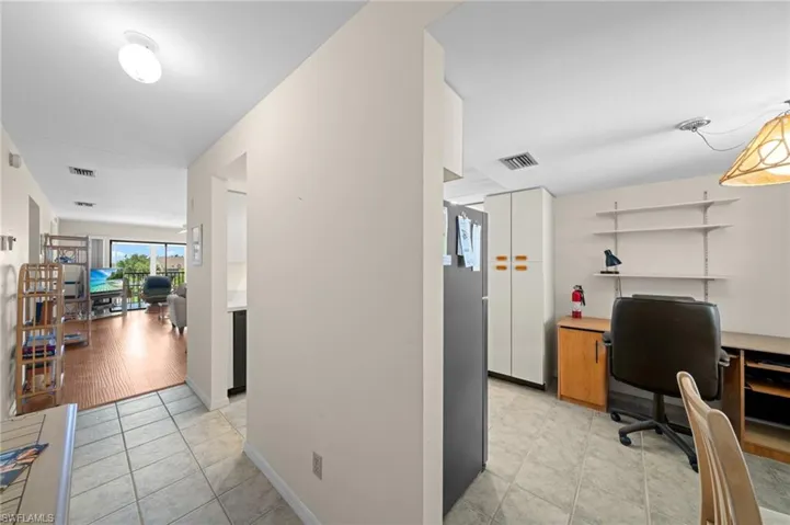 Home office featuring light tile patterned floors