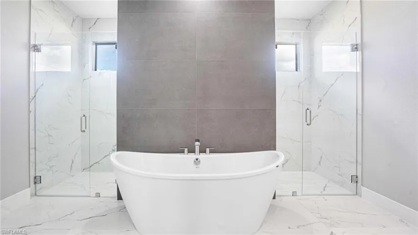 Bathroom with plus walk in shower