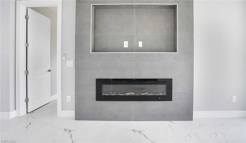 Room details featuring a fireplace