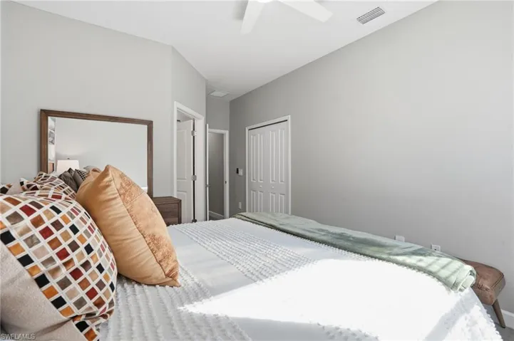 Bedroom featuring a closet and ceiling fan