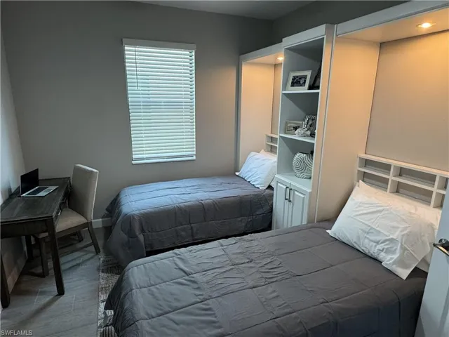 Bedroom with wood finished floors