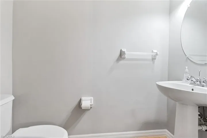 Bathroom featuring toilet and sink