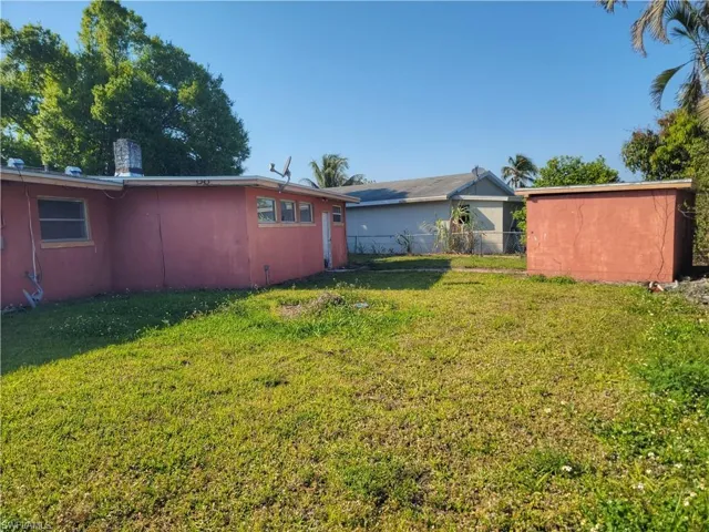 View of yard featuring fence