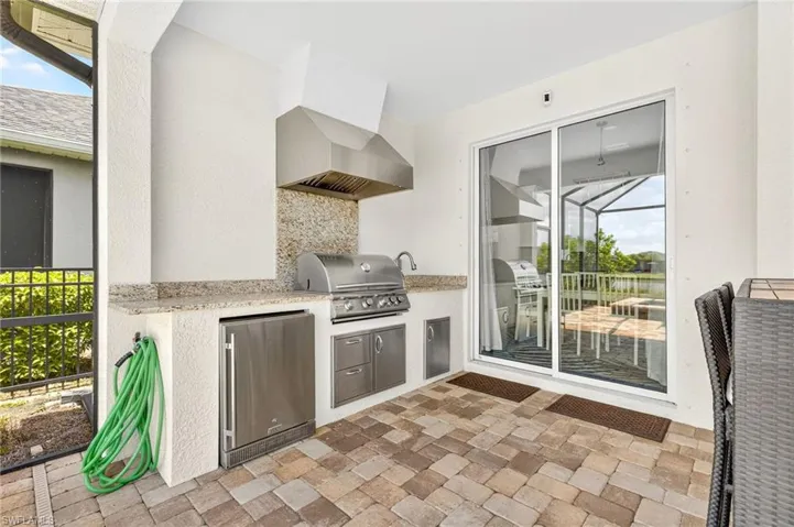 View of patio / terrace featuring exterior kitchen
