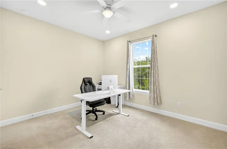 Office featuring carpet floors, ceiling fan, and recessed lighting