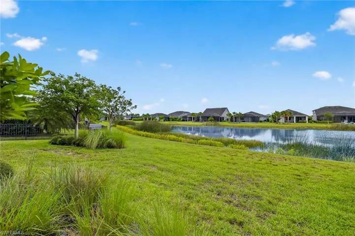 Water view with nearby suburban area