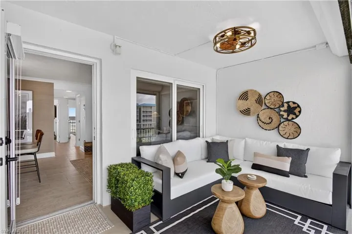 Spacious front screened balcony welcomes you into your home.