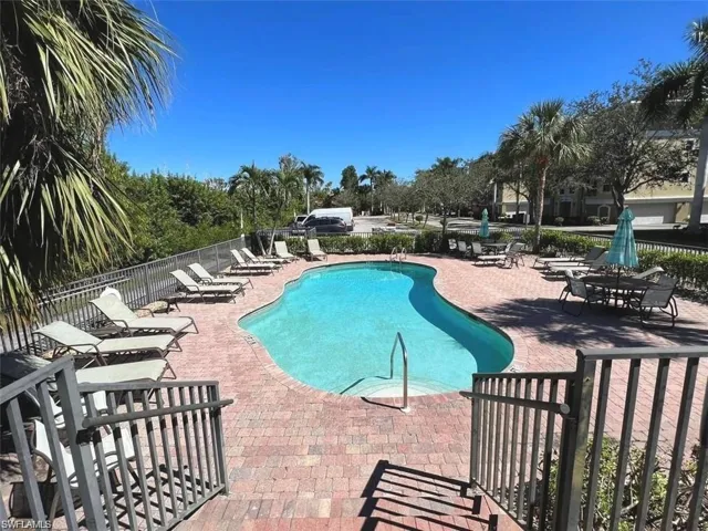 View of swimming pool with a patio area