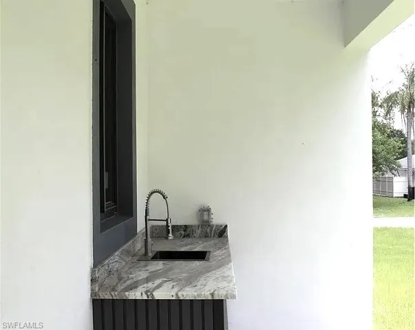 2504 E 2nd  ST, Lehigh Acres, FL 33936