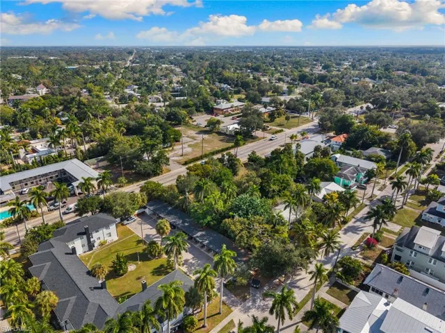 Aerial overview of property's location with nearby suburban area