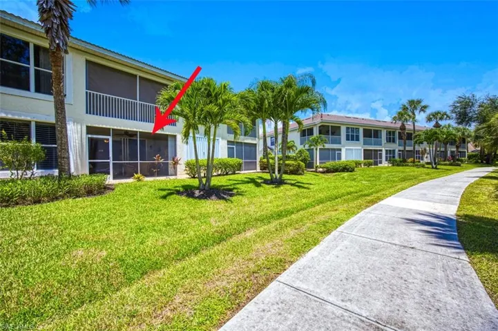 Surrounding community featuring a lawn