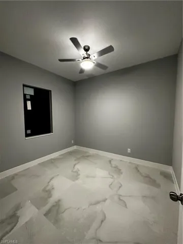 Bedroom with remote controlled ceiling fan