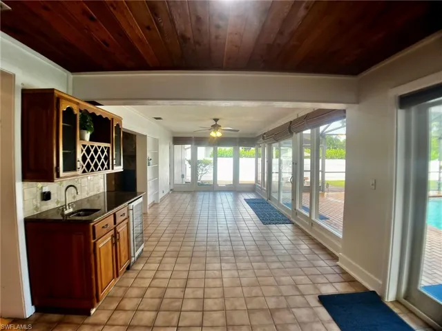 Sun room showing wet bar