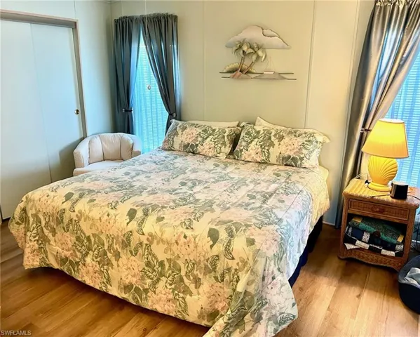 Bedroom with wood finished floors