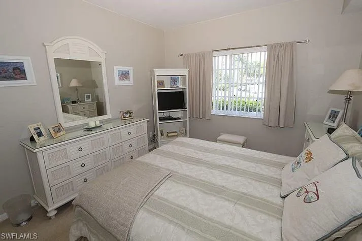 Bedroom with carpet flooring