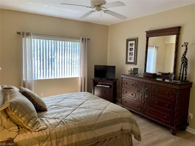 Bedroom featuring light wood-style flooring and ceiling fan