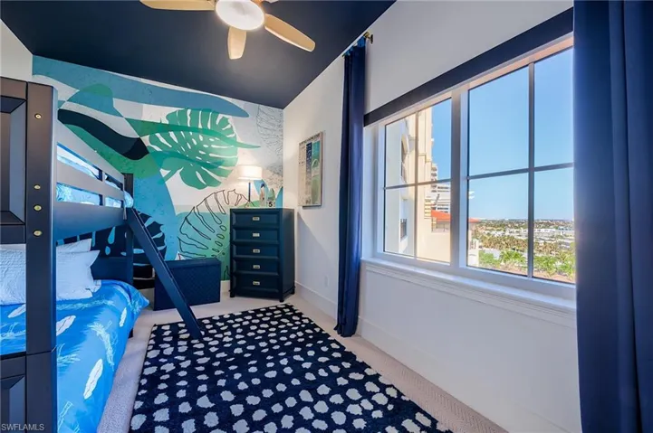 Bedroom featuring carpet floors and a ceiling fan