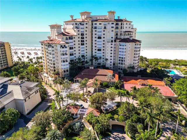 View of apartment building / complex with a water view