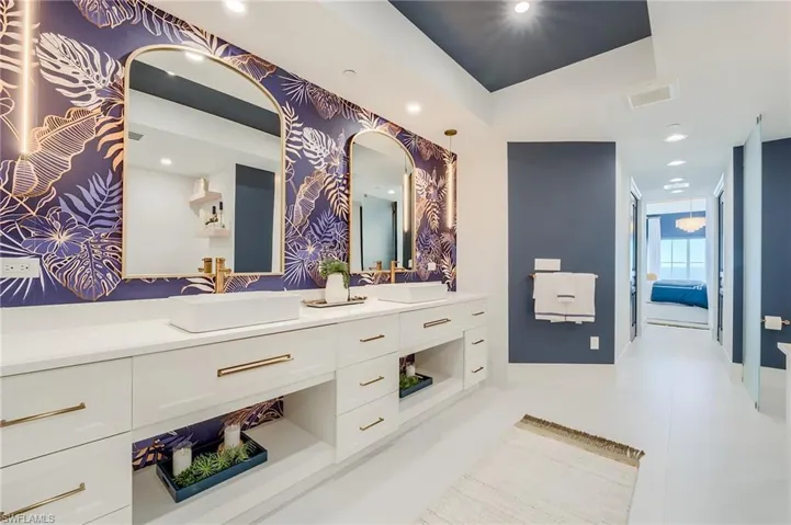 Full bath with vanity and recessed lighting