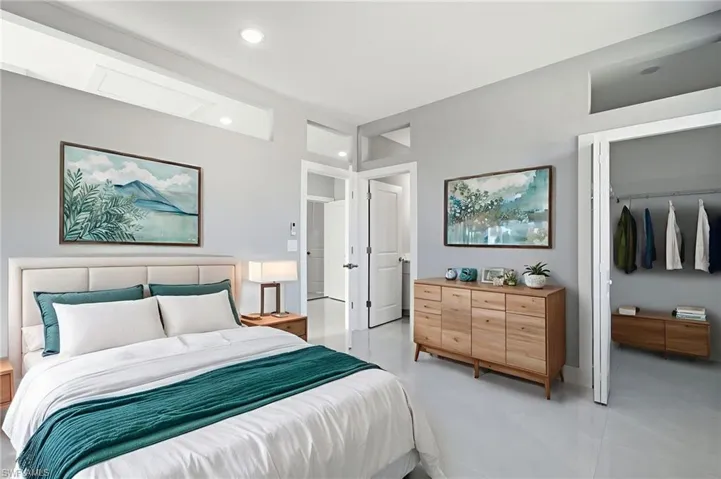 Bedroom featuring finished concrete flooring