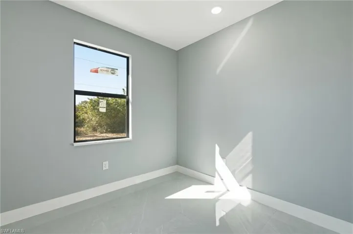 Spare room with baseboards