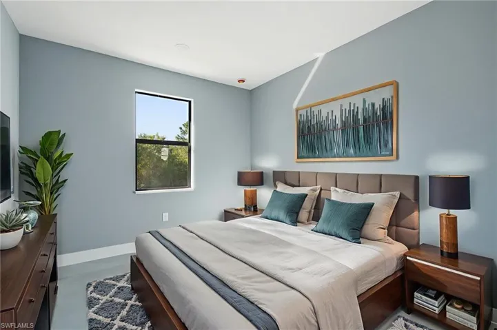 Bedroom featuring baseboards